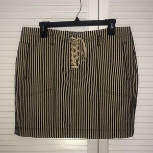 Stripped mini skirt with lace up detail